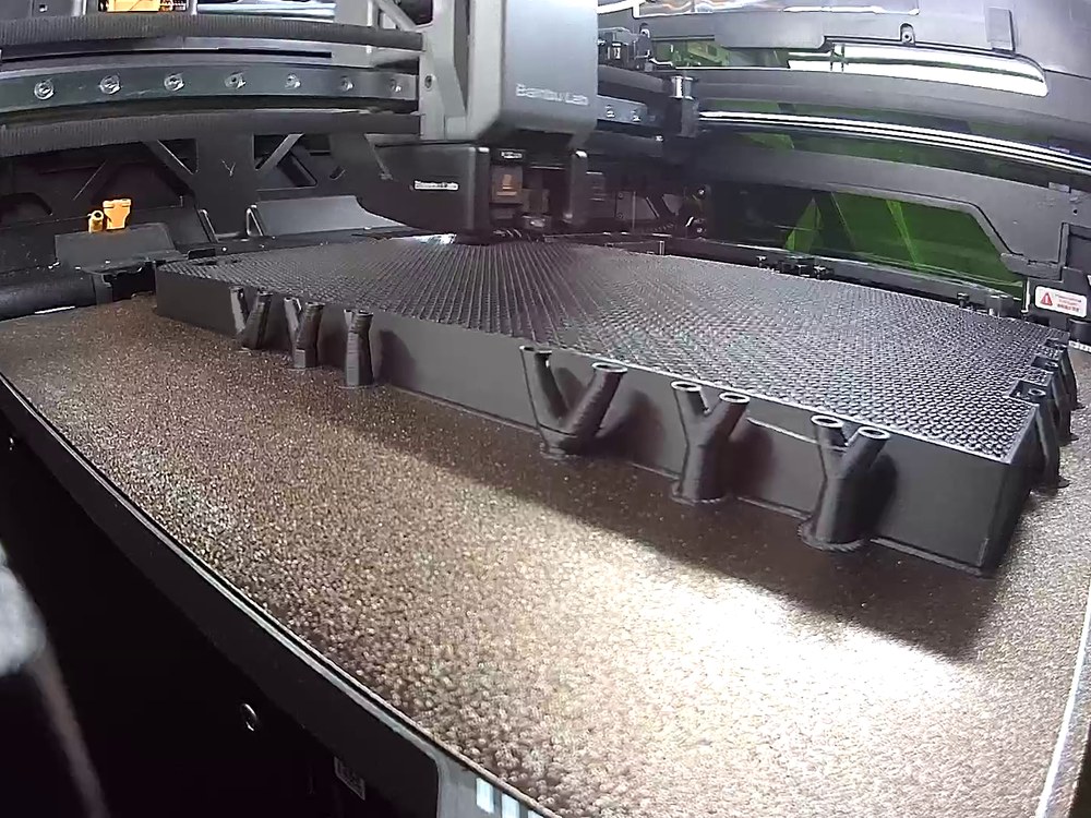 Black base layer of an Explorer Board display section printing on a Bambu Lab 3D printer