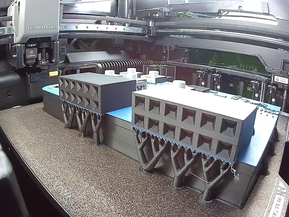 Dark grey connector housings and light grey components printing on an Explorer Board display section